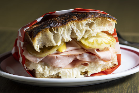 Mortadella, salami, milky-fresh cheese and green tomatoes in focaccia is available at lunch.