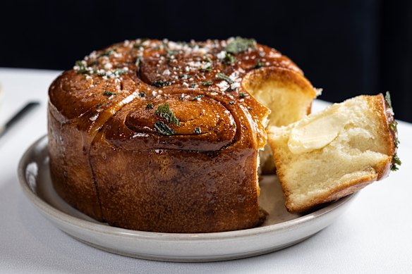 Bread, a crown-shaped brioche brushed with a caramel made from vegetable scraps, is complimentary.