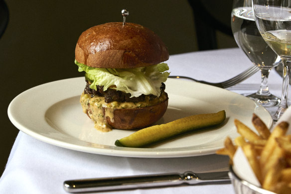 A cheeseburger and beer on tap is part of the relaxed offering.