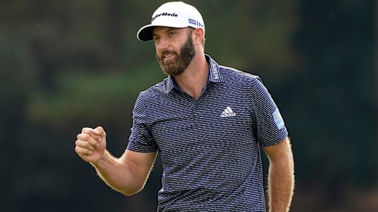 Dustin Johnson celebrates after winning his first Masters tournament in Augusta, Georgia.