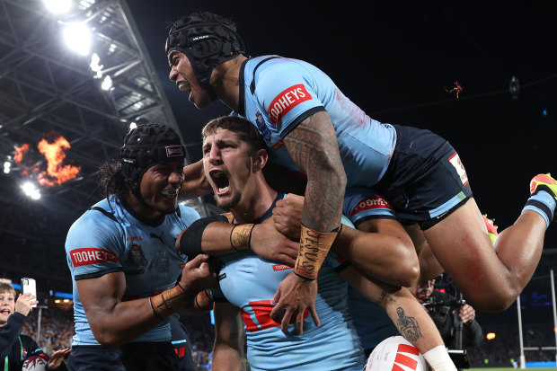 Zac Lomax celebrates his first Origin try.