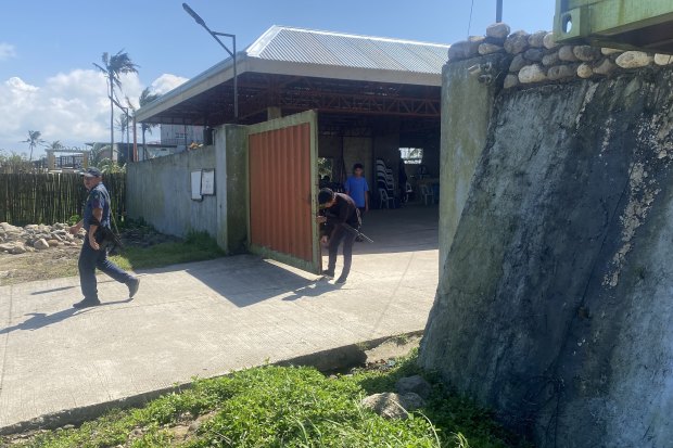 Security personnel at the entrance of the Degamo family compound this week.