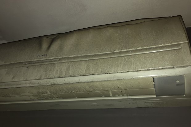 A burnt air conditioner in one of the damaged apartments at Neo 200.