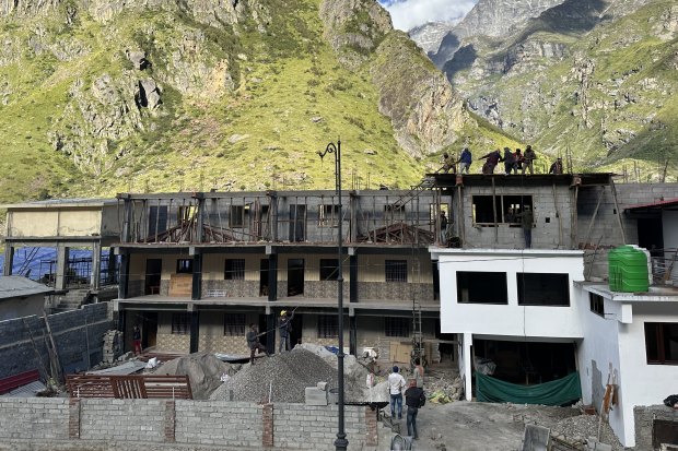 Workers build infrastructure in Badrinath.
