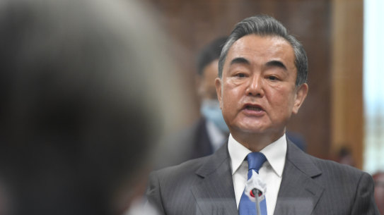 "I would kick the ball to Australia": China's foreign minister Wang Yi says the two nations can improve their relationship. 