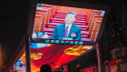 A news report of Xi Jinping, China’s president, at the National People’s Congress displayed a screen in Beijing, China.