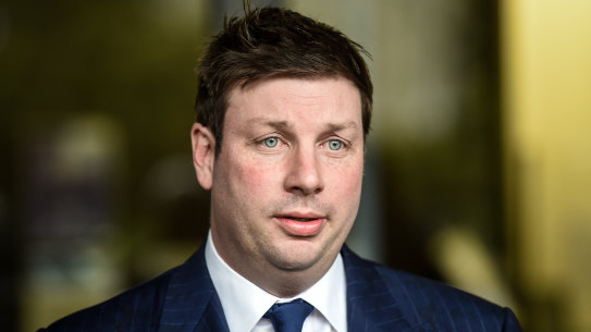 Opposition MP Tim Smith faces the media after crashing his car on Saturday night and recording an alcohol reading of more than twice the legal limit.