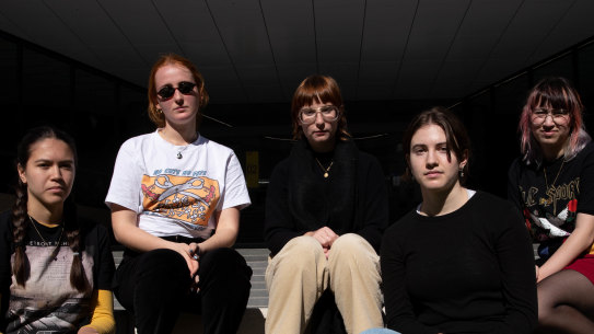 UTS students, (L-R) Luca Pearce, Ellie Woodward, Holly Hayne, Cate Wheadon, and Melodie Grafton, at a protest about funding cuts and staff losses at the university in Sydney. 19th May 2021 Photo: Janie Barrett