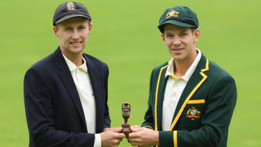 England captain Joe Root with the Ashes and Australian skipper Tim Paine.