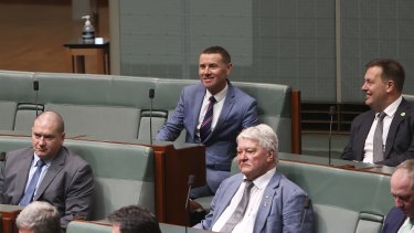 Andrew Laming (centre, rear) has survived a Labor attempt to remove his position as chair of a parliamentary committee.