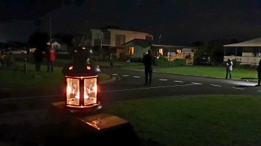 Local residents at Pinedale Avenue at Cape Woolamai on Phillip Island observed a special Anzac dawn service together.