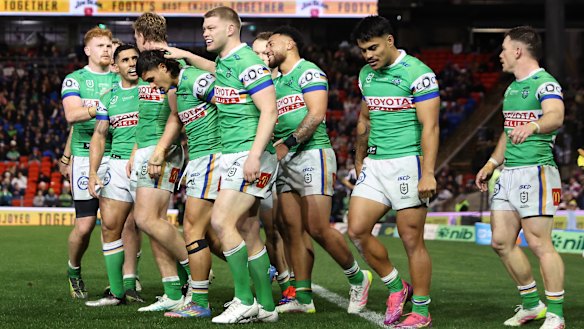 Canberra celebrate a try against Newcastle.