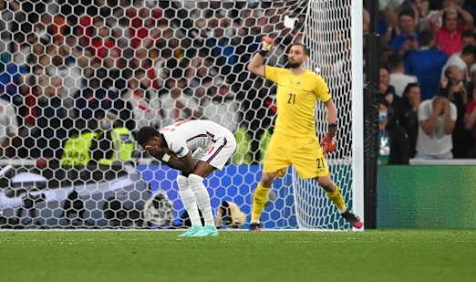 Marcus Rashford took England’s third penalty and hit the post