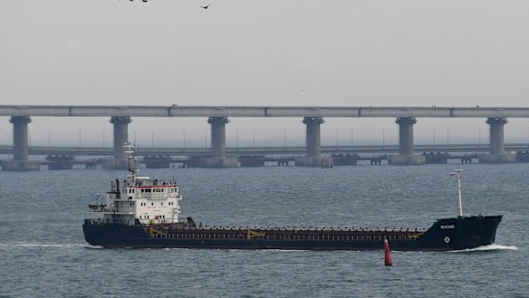 A ship travels near the Kerch bridge on Monday as the Ukraine implemented martial law following an incident with Russia in the Kerch Strait.