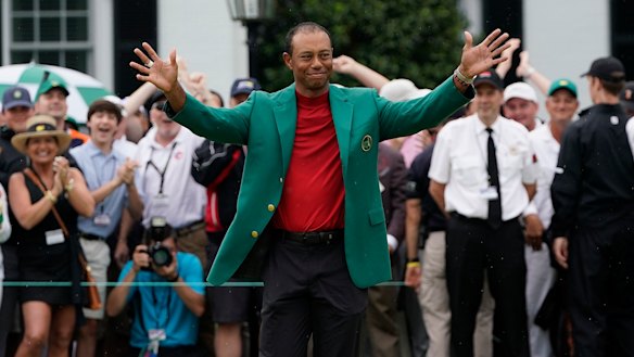 Tiger Woods celebrates after winning the Masters golf tournament.