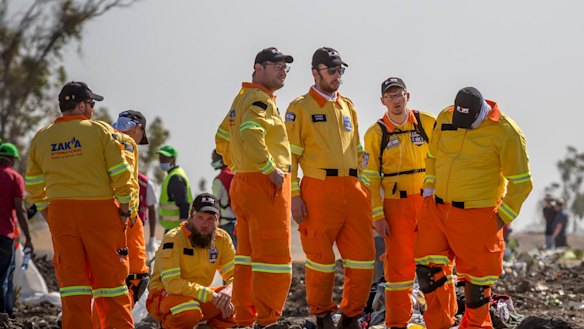 Investigators comb through the wreckage of the Ethiopian Airlines Boeing 737 MAX jet that crashed shortly after takeoff on March 10. 