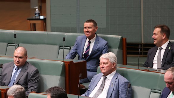 Andrew Laming (centre, rear) has survived a Labor attempt to remove his position as chair of a parliamentary committee.