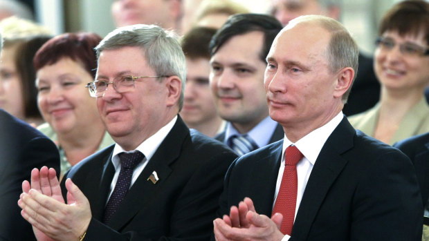 Alexander Torshin, a member of the Federation Council, Russia's upper house, and Vladimir Putin, who was prime minister at the time, at an awards ceremony at the Kremlin in 2011.