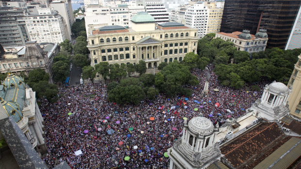 People protest against leading presidential candidate Jair Bolsonaro, at Cinelandia Square in Rio de Janeiro on Saturday.