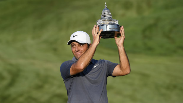 Off the mark: Francesco Molinari celebrates his first PGA Tour victory in Potomac.