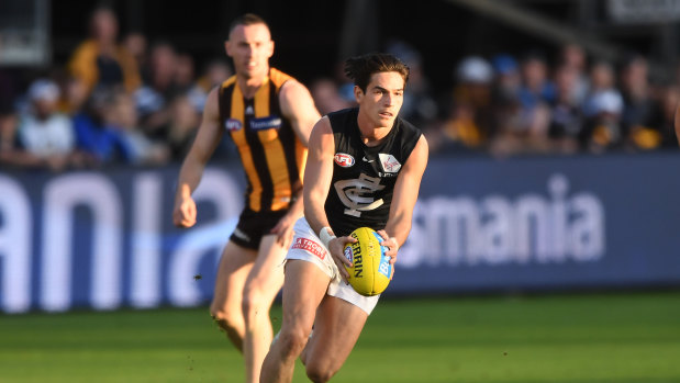 Ray of light: Zac Fisher runs into space for Carlton.