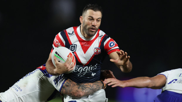 Roosters captain James Tedesco pushes through against the Bulldogs last month.