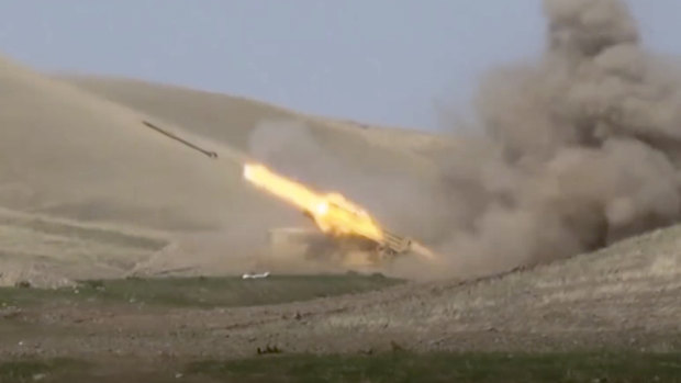 An Azerbaijan rocket launches from a missile system at the contact line of the self-proclaimed Republic of Nagorno-Karabakh, Azerbaijan. 