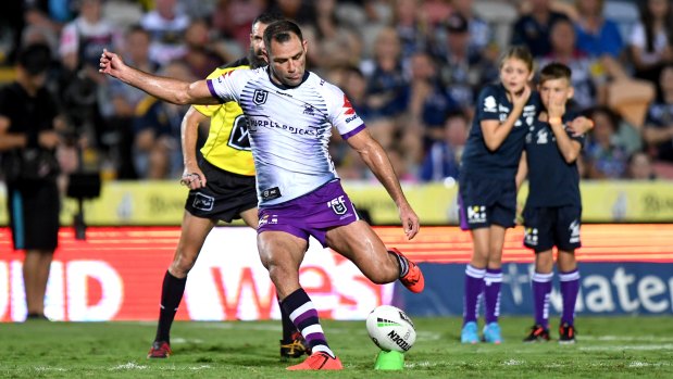 Still on top: Cameron Smith breaks the NRL point-scoring record as his children Jada and Jasper look on.