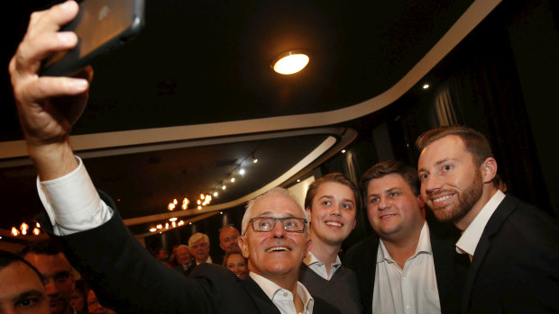 Punters grab a selfie with the Prime Minister at the Seaford Hotel on Tuesday night.