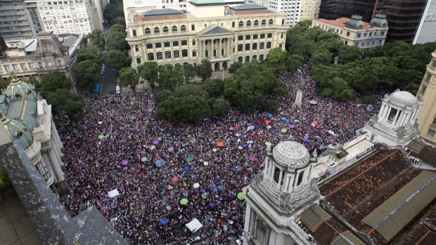 People protest against leading presidential candidate Jair Bolsonaro, at Cinelandia Square in Rio de Janeiro on Saturday.