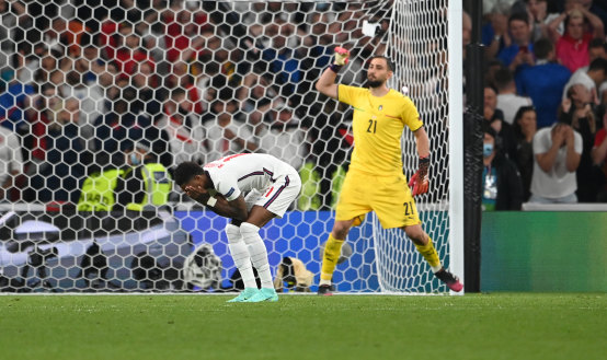 Marcus Rashford took England’s third penalty and hit the post
