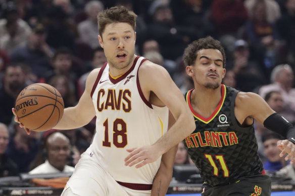 Matthew Dellavedova is at home with his baby son while the NBA is shut down.