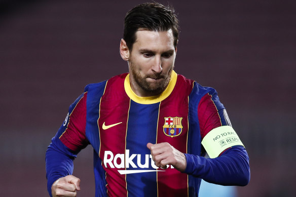 Lionel Messi celebrates his early penalty for Barcelona.