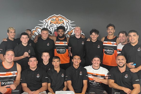 Indigenous Wests Tigers players, including James Roberts and Daine Laurie, talk about the opportunities at the club with a group from Awabakal, an Indigenous medical service.