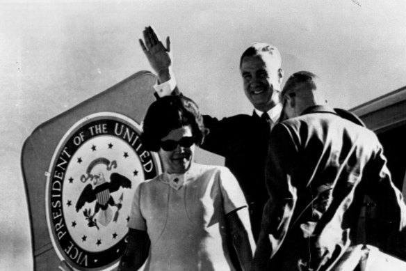 
"A wave of greeting from Mr. Agnew as he and Mrs. Agnew leave the U.S. Presidential jet at Fairbairn R.A.A.F. base, Canberra yesterday. On the aircraft is Mr. Agnew's Vice-Presidential seal." January 14, 1970
