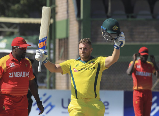 Finch celebrates a century against Zimbabwe in 2018 on the way to a world record T20 score of 172