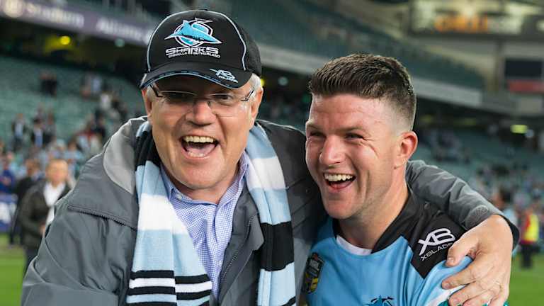 Pressing the flesh: Prime Minister Scott Morrison hugs Chad Townsend after his heroics at Allianz Stadium.