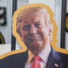 Cutouts of President Nayib Bukele of El Salvador, left, President-elect Donald Trump, center, and Elon Musk, at the Bitcoin MENA 2024 conference in Abu Dhabi, United Arab Emirates, 