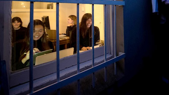 Georgia Rousselot, 25, with her three housemates as they work from home in a Redfern sharehouse.