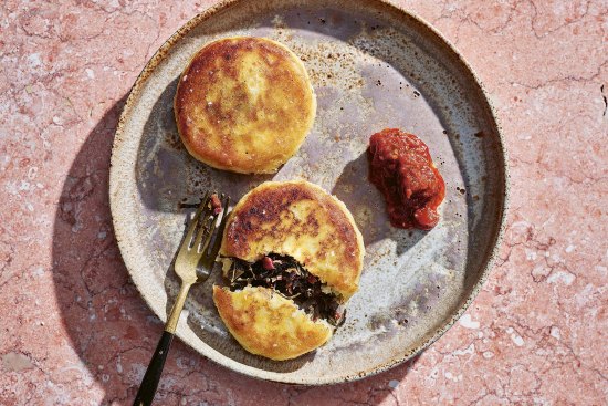 Stuffed potato cakes with tomato-chilli relish.