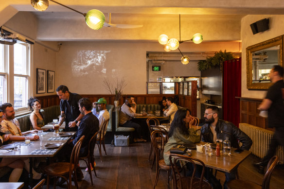 Mesa Verde’s interior features horse-shoe booths, Spaghetti Western projections and coloured pendant lights.