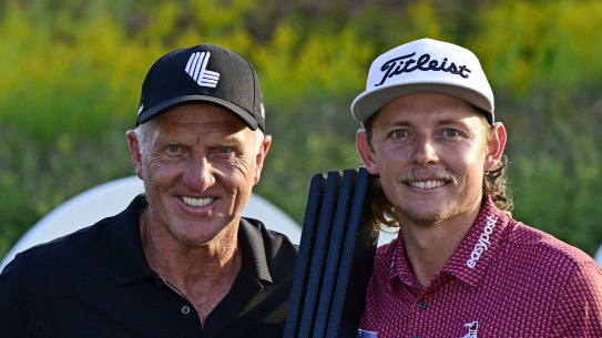 Cameron Smith with LIV Golf chief executive Greg Norman after his win in Chicago.