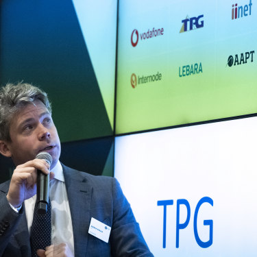 ASX Senior Manager Andrew Weaver launching the combined Vodafone TPG as a new listing on the stock exchange.