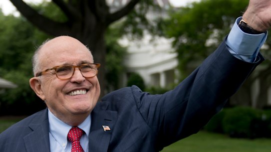 Rudy Giuliani, a lawyer for President Donald Trump, waves to people at the White House.