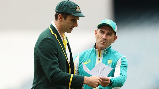 Pat Cummins and Justin Langer before the toss on Boxing Day.