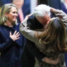 Lawyer Jennifer Robinson watches on as Julian Assange is greeted by his wife Stella upon his return to Australia last week.