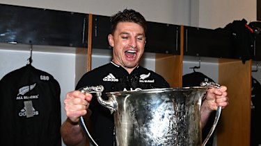 Beauden Barrett gets his hands on the Bledisoe Cup.