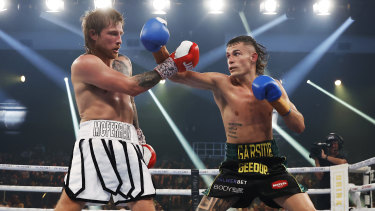 Harry Garside throws a punch during the Australian Lightweight Title bout against Layton McFerran.