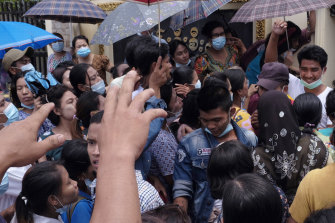 A crowd outside Insein Prison greets prisoners released by the Myanmar military junta on April 17.