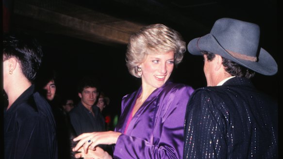 Princess Diana and Molly Meldrum attend a charity rock concert at the Melbourne Concert Hall.